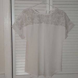 White blouse with lace on top